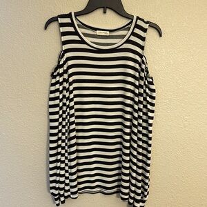 Women’s long sleeve striped shirt with cut out shoulders size medium.